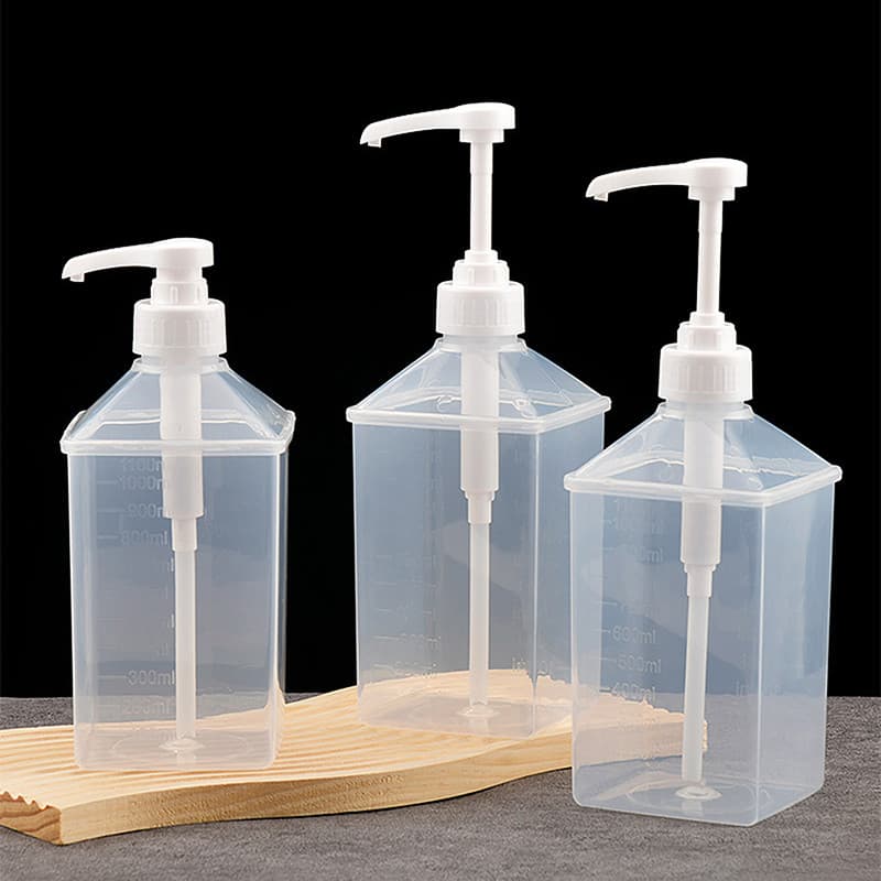 *NT* เครื่องจ่ายน้ําเชื่อมที่มีประโยชน์ 1100ml Multi-Function Liquid Pump แรงดันมือ Fructose ยาน้ําเชื่อมเชิงปริมาณบีบน้ําผึ้งขวดพลาสติก {T} - รูปที่ 1