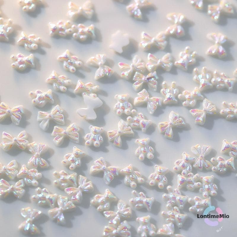 LontimeMio] 50 ชิ้นสีขาว Symphony หมี Bowknot เล็บ Charms ตกแต่งศิลปะฤดูร้อน Charms Auroras 3D โบว์ DIY เล็บอะไหล่อุปกรณ์เสริมใหม่ - รูปที่ 1